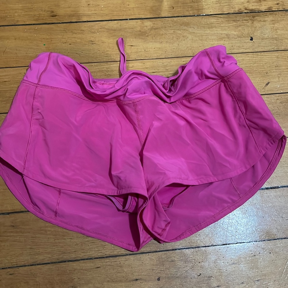 Bright pink Lululemon hotty hot shorts